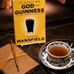 God and Guinness Book with teacup