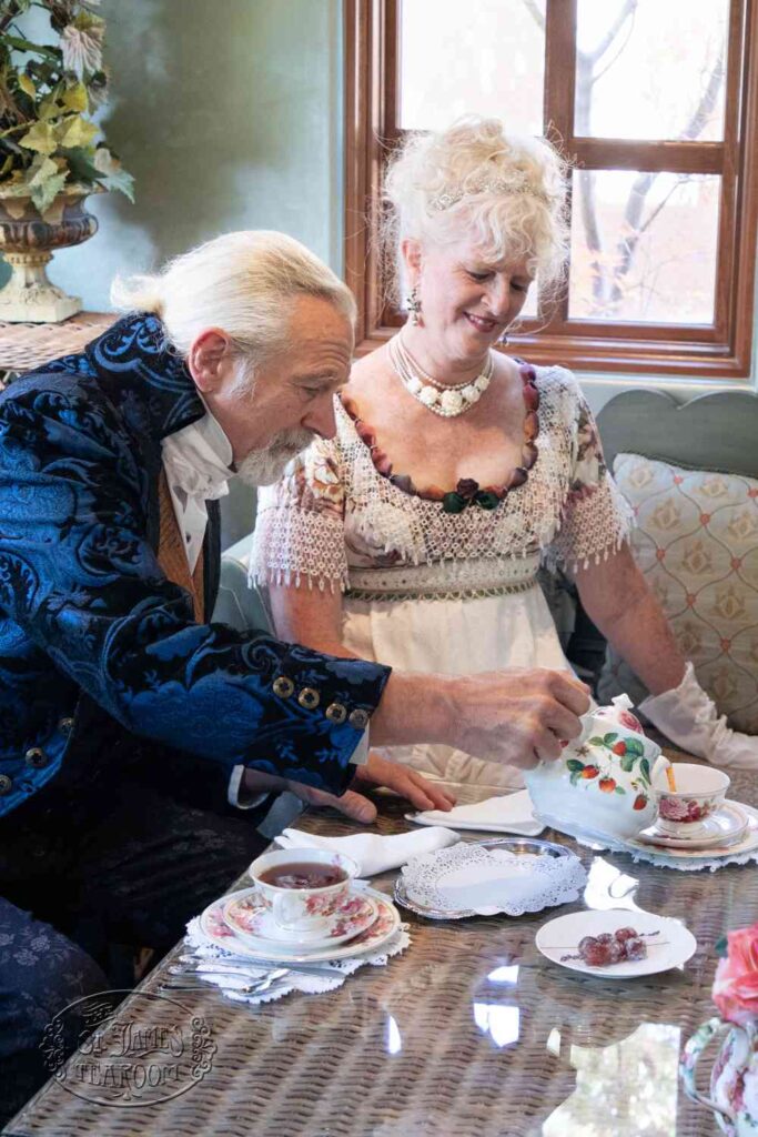 Couple Dresses in Regency Attire for Teatime