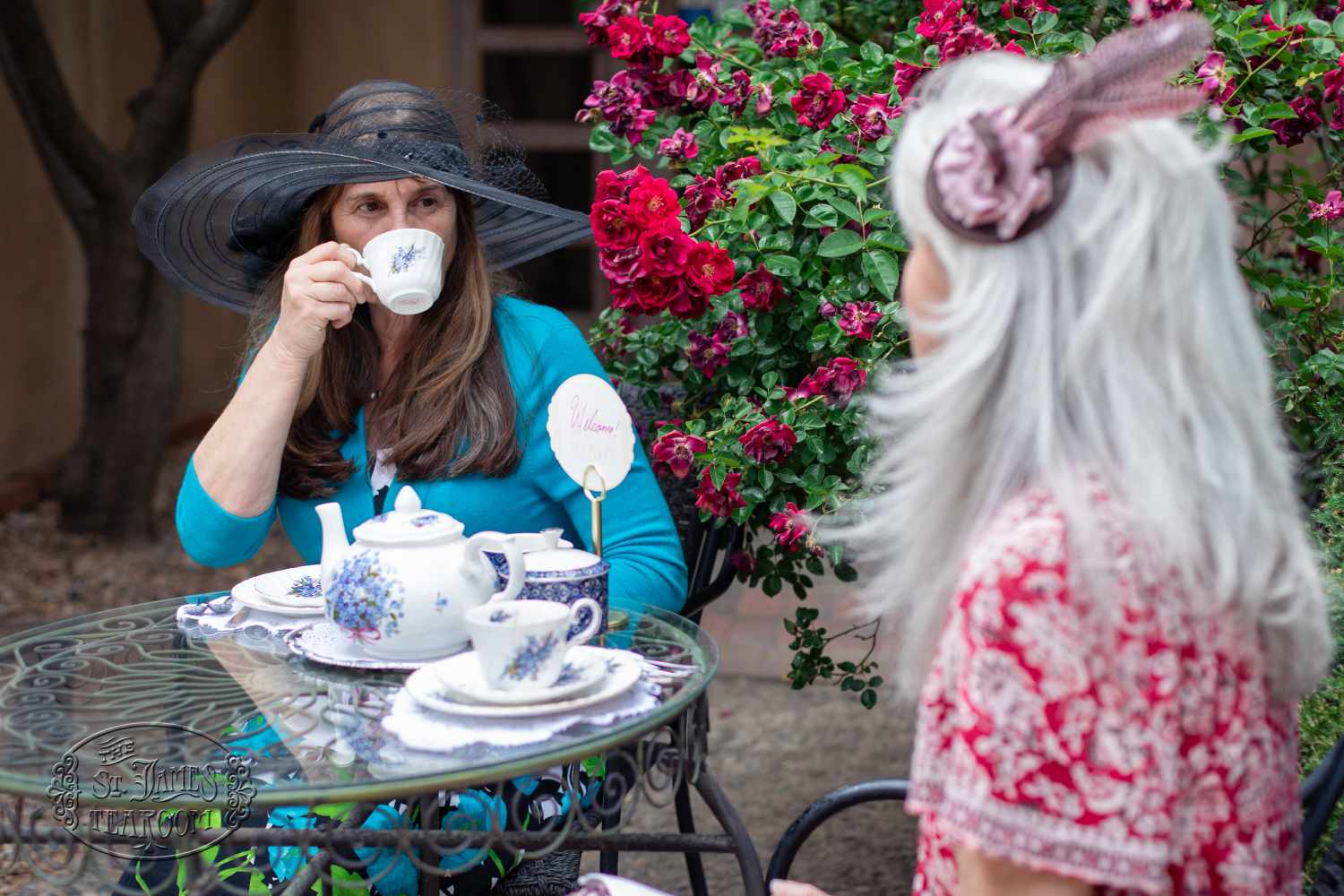 Friends having tea together in the garden.