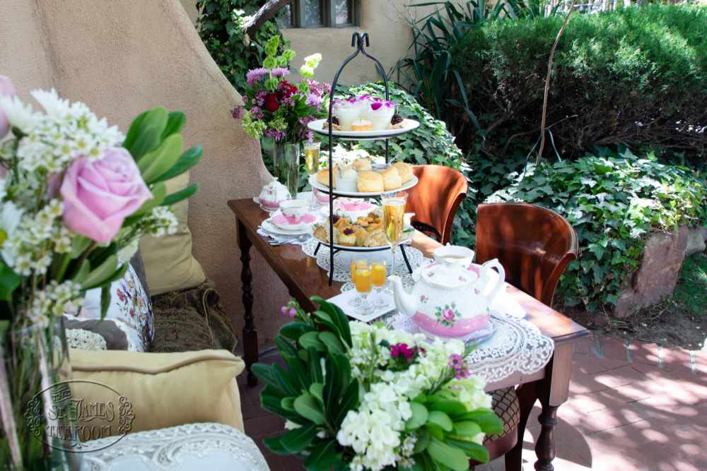 Teatime in the Garden with three-tiered tray and teapot.