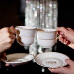 New Years Clinking Teacups